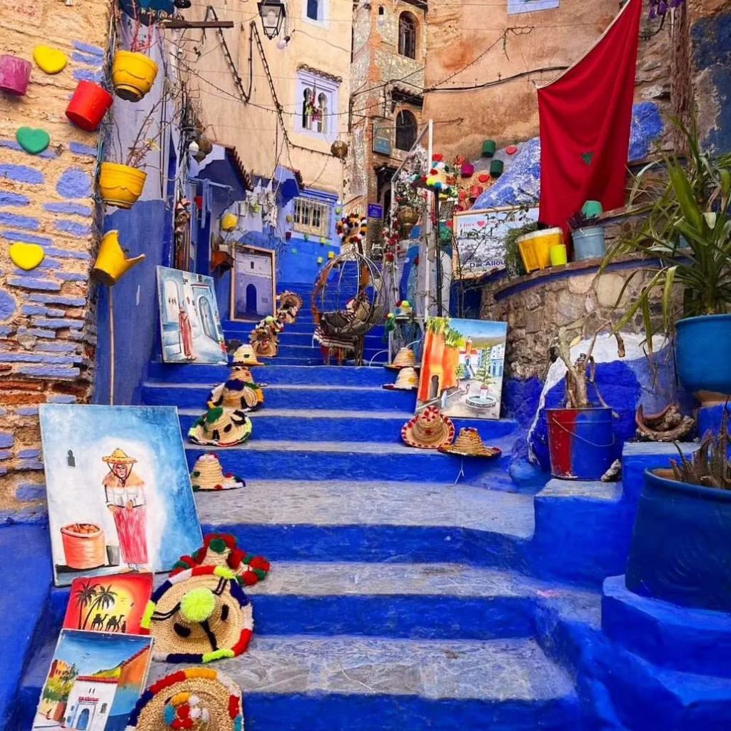 Steps in Chefchaouen with items for sale